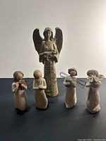 all five figurines front view