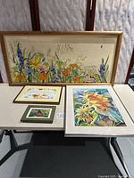 Group view of all four framed artworks
