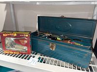 Toolbox and boxed staple gun overall view