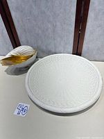 Platter and shell bowl side by side