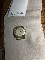 Front view of Bulova 14K gold watch without band