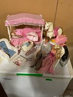 Group shot showing dolls, furniture, horse, car
