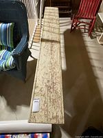 Top view showing full length of bench and distressed paint