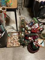 Group shot showing wrapping paper bag, ornaments, baskets and décor