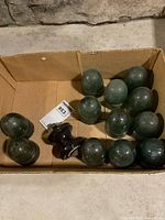 Box containing 12 glass insulators and 1 porcelain insulator