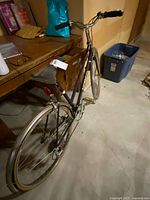 Full view of Norco step-through bicycle from rear quarter