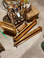 Group shot showing picnic basket, wine rack, towel bars, wicker baskets