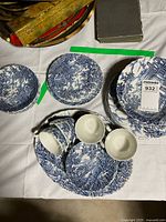 assorted plates, cups, bowls displayed