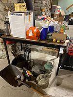 Full view of utility table with items on top