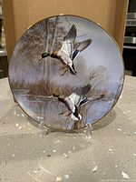 Front of plate showing mallard ducks artwork
