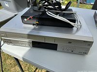 Front view of Panasonic DVD/CD player with Motorola receiver and cables