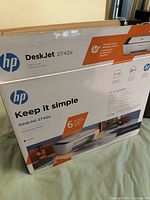 Retail box showing HP DeskJet 2742e model details