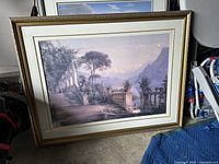 Full view of framed print in gold frame