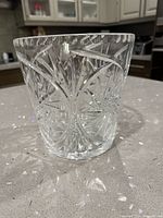 Overall view showing pinwheel cut pattern on side of crystal ice bucket
