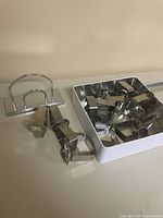 Clamps, tin box and napkin holder overall view