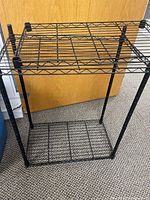 Front view of assembled rack showing top and bottom shelves