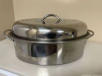Pan with lid on, showing overall appearance and handles