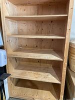 Full front view of six-shelf plywood unit