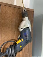 Side view of Mastercraft drill showing cord, trigger and housing