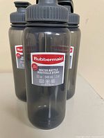 Front view of three Rubbermaid water bottles showing labels