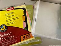 Pack of subject dividers and stack of sheet protectors