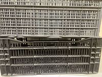 Front view showing vented sides of two stacked crates