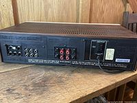 Rear view of Hitachi SR-4010 showing all connection panels and vented top