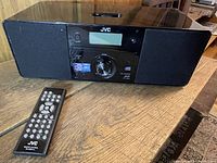 Full view of JVC RD-N1 unit with remote control