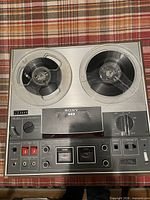 Front view of Sony TC-366 with both reels mounted, control panel visible