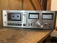 Front angled view of Sony TC-K4A deck showing full control panel and wood sides