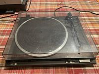 Technics SL-BD20 turntable angled view with dust cover