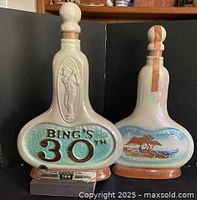 Front view showing BING’S 30TH panel and stoppers inserted