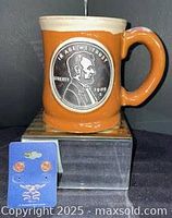 Mug and earrings together for scale and set overview