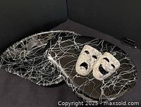 Covered candy dish base and matching trinket dish showing interior white veining