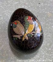 Top view showing bird motif on egg-shaped box