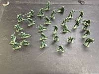 Top view of entire group of plastic soldiers spread on surface