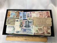 Tray showing full assortment of banknotes