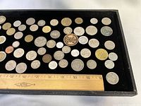 Top view of entire tray with all coins for count and layout