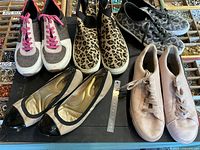 All five pairs of shoes displayed together