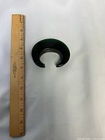 Cuff beside ruler showing dimensions and shape