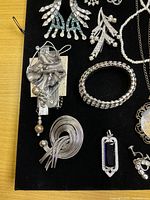 Overall tray of silver-tone rhinestone jewellery
