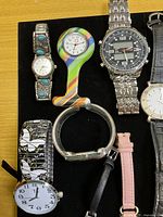 First group of watches on black display board