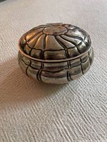 Closed trinket box perspective view showing melon ribs