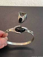 Bracelet front view and ring background