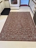 Full view of rug laid in kitchen showing overall design and size