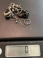 Group of assorted sterling jewellery on digital scale