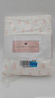 Front view of sealed Northern Nights queen sheet set showing brand label and pattern