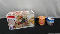 Sealed Rubbermaid Servin' Saver box with two additional sealed container packs