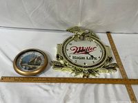 Miller High Life decorative clock and round scenic art clock with measuring stick for scale