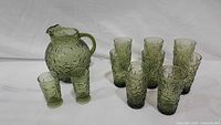 Full set showing pitcher, eight tall glasses, two short footed glasses